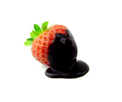 strawberry dipped in chocolate over white background