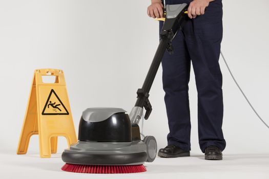 cleaning floor with machine