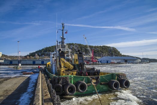 tug "boa sund" is currently moored to the quay at the port of halden, the image is shot in february 2013.