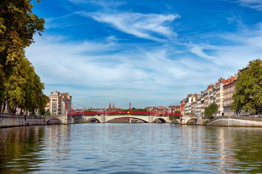 View of Lyon with Saone river and famous red footbridge