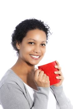 Studio shot of smiling woman with red cup of coffee isolated on white