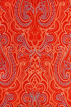 red abstract pattern on arabic fabric