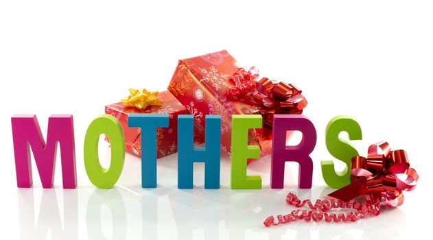 letters in red green blue with mothers text on white background