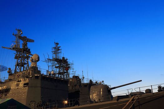 battleship with sunset behind