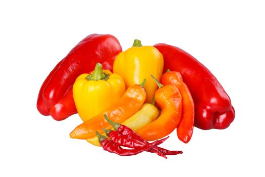 Mixed group of ripe red, yellow and orange sweet, medium and hot peppers including cayenne, banana and bell (Capsicum annuum) isolated against a white background