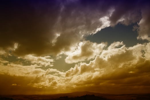 A dramatic cloudy sky over light hills(hdr)