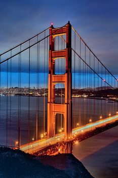 famous Golden Gate Bridge and San Francisco lights at sunset
