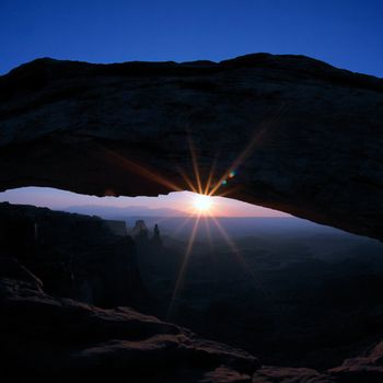 Sunrise at famous Mesa Arch in Canyonlands National Park, Utah, USA 