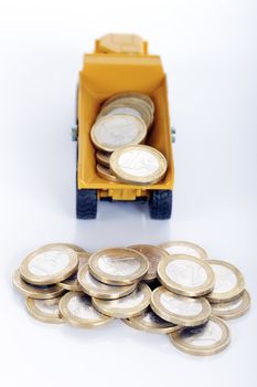 euro money coins and truck isolated on white background 