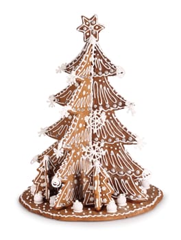 Baked Gingerbread Christmas tree decoration with sugar icing