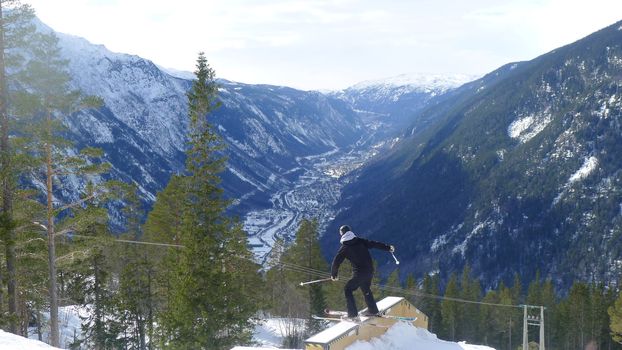 Railing at Gaustablikk snow park, with Rjukan in background