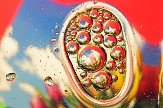 Oil drops on a water surface