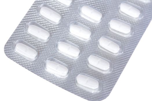 Closeup of foil wrapped tablets