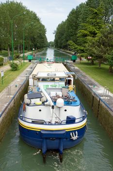 Barge, passage of a lock  France