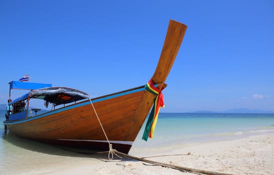 long tail boat sit on the beach,Lipe island, Thailand