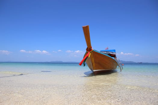 long tail boat sit on the beach,Lipe island, Thailand