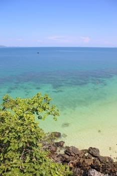 Beautiful white sand beach on island with crystal clear sea, Andaman sea, Thailand