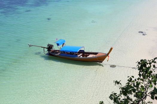 Traditional Thai longtail boat at the beach