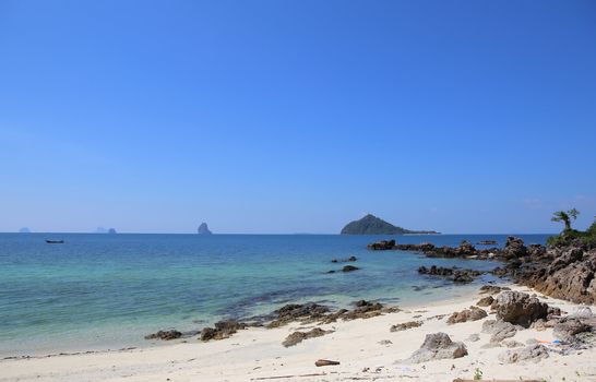 beach with rocks and blue sky,Thailand