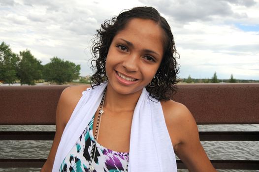 African American female beauty posing outside.