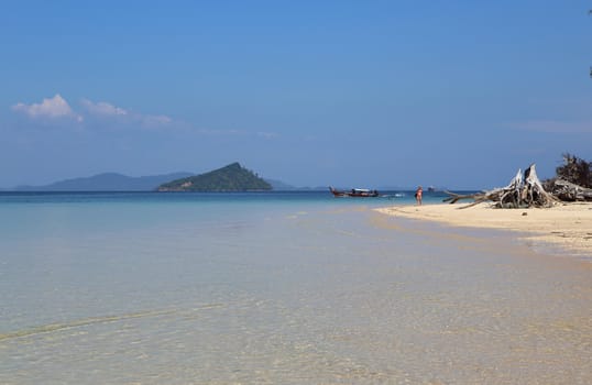 Beautiful white sand beach on island with crystal clear sea, Andaman sea, Thailand