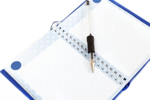 Close-up of empty notes with black pen on white background