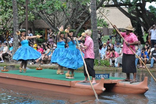 Students perform traditional Hawaiian dance at a canoe pageant at the Polynesian Cultural Center in Oahu, Hawaii