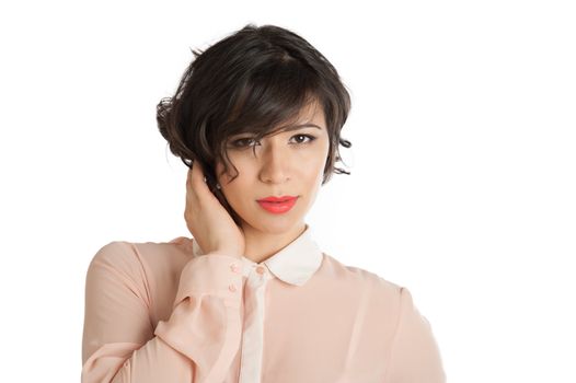 Portrait of a woman in a pink blouse on a white background isolated