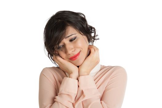 Portrait of a woman in a pink blouse on a white background isolated