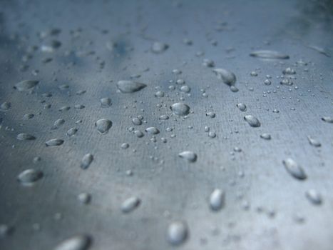 The image of droplets of water on glass