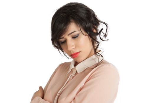 Portrait of a woman in a pink blouse on a white background isolated