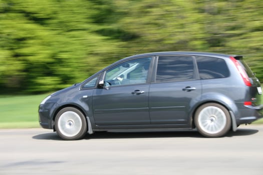 fast car on the road with green background