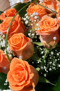 nice orange roses from the wedding table