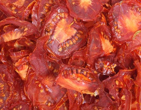 tomato background from the dried slices of tomatoes