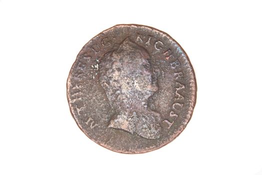 old copper coin on the white background