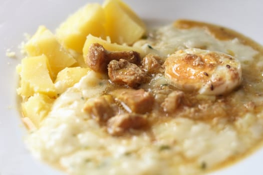 TV dinner detail - potatoes, meat, egg