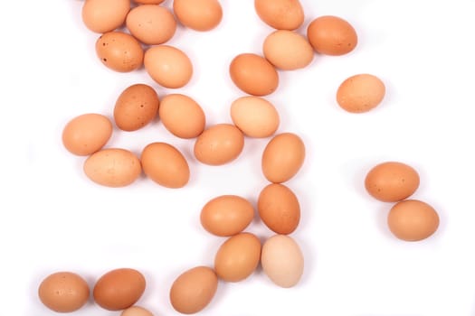 30 brown eggs on the white background