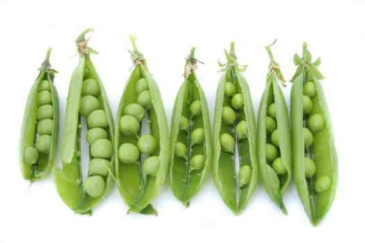 fresh green pea on the white background