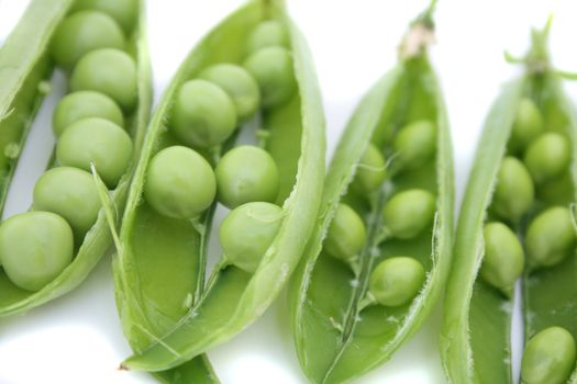 fresh green pea on the white background