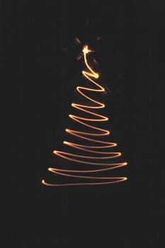 xmas tree isolated on the black background