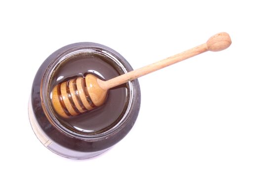 glass of honey on the white background