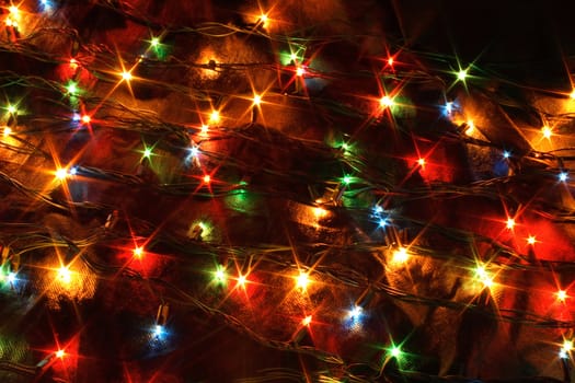 color xmas lights on the black background