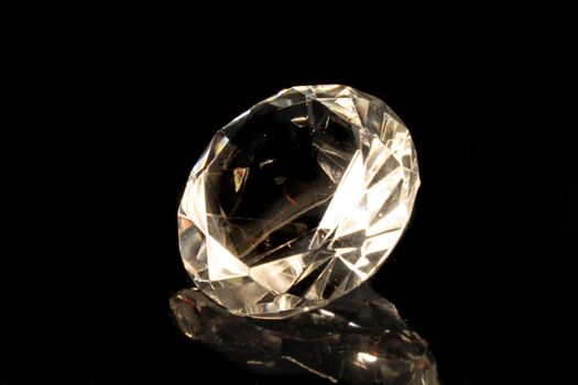 big shiny diamond on the black background 