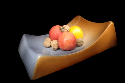 nuts and fruits on the original plate 