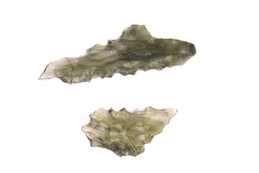 green czech gemstone on the white bakground