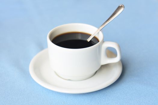 cup of cofee on the blue background 