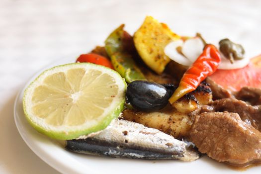 gourmet food with fishes fruits and  vegetable