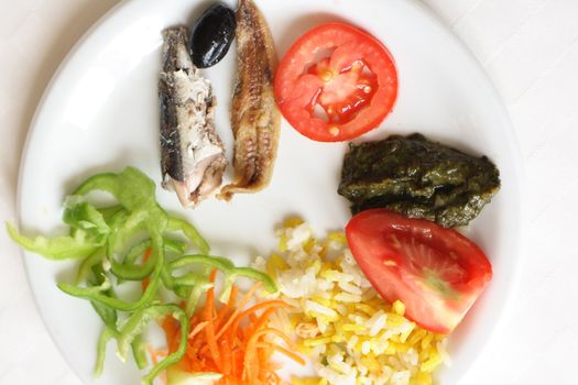 gourmet food with fruits vegetables and fishes