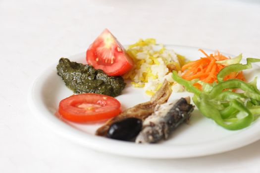 gourmet food with fruits vegetables and fishes