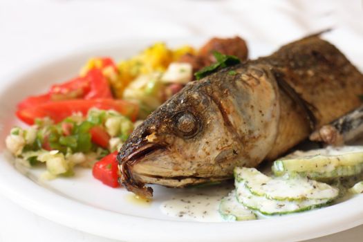 gourmet food with fishes fruits and  vegetable